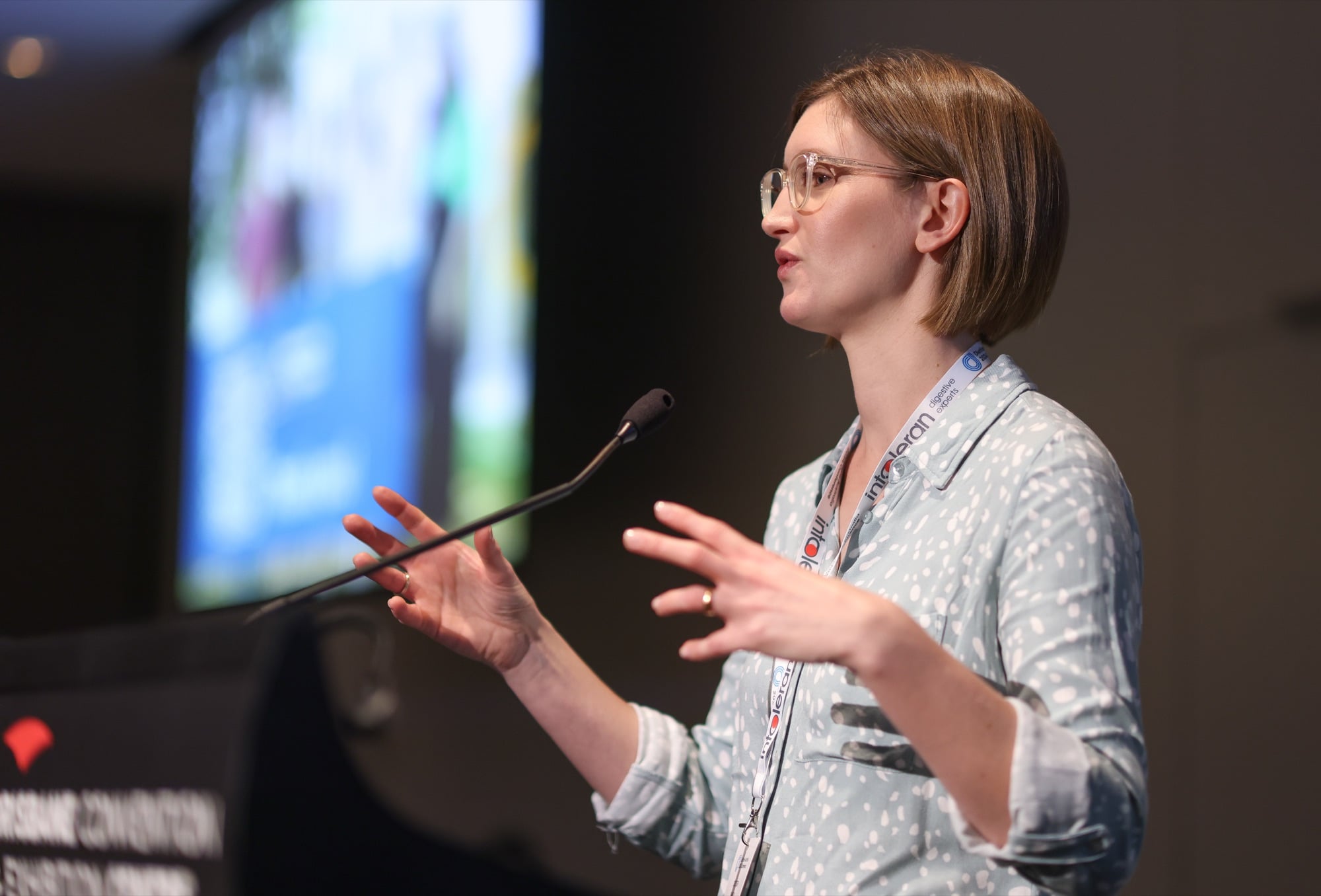 A presenter speaking to the audience at the 2024 Dietitians Australia conference